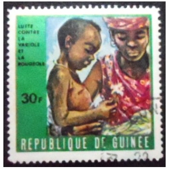 Imagem do selo postal da Rep. da Guiné de 1970 Mother and sick child anunciado