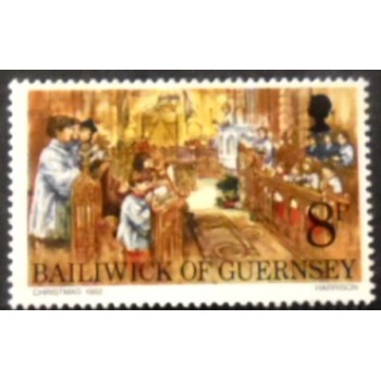 Imagem do selo postal de Guernsey de 1982 Midnight mass St. Peter Port Church anunciado