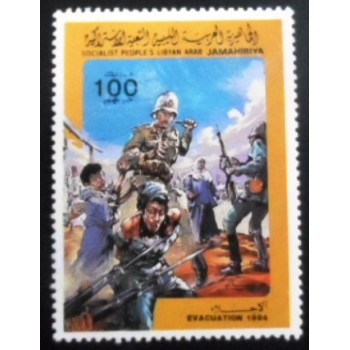 Imagem do selo postal da Líbia de 1984 European soldier whipping a woman