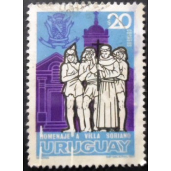Selo postal do Uruguai de 1973 Friar Indians and church