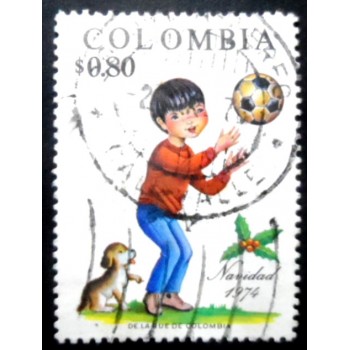 Selo postal da Colômbia de 1974 Boy Puppy and Soccer Ball