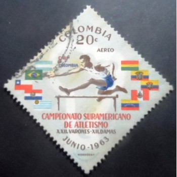 Selo postal da Colômbia de 1963 Hurdler and Flags