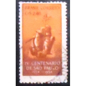 Imagem similar à do selo postal de 1953 Padre Plantando Árvore U